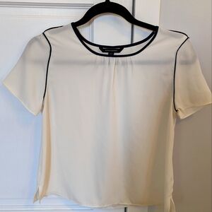 Blouse XXSP with beautiful detailing around the neck line in Blue